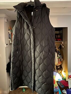 Knee length quilted vest